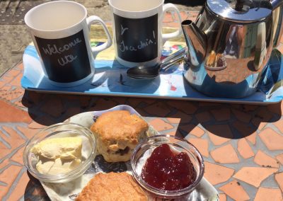 Willkommen mit Creamtea und Scones